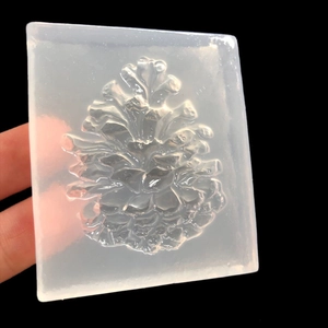 Translucent silicone pinecone mold for forest themed fondant and DIY resin crafts