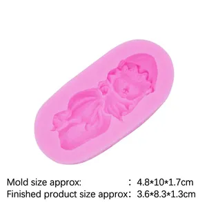 Pink silicone mold featuring sleeping baby angel design for handmade soap and cake decor