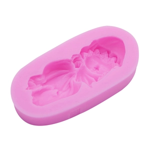Pink silicone mold featuring a detailed 3D sleeping baby design for soap and cake decor