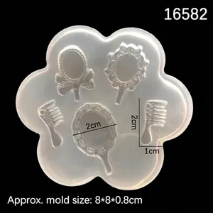 Silicone mold featuring vintage mirror and comb shapes for fondant, resin, and clay crafts