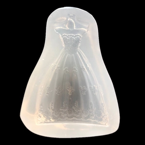 Macro detail of puffy dress silicone mold showing intricate lace and floral relief textures