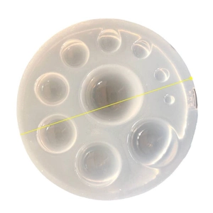 Semi-transparent silicone mold with nine circular cavities for resin jewelry making