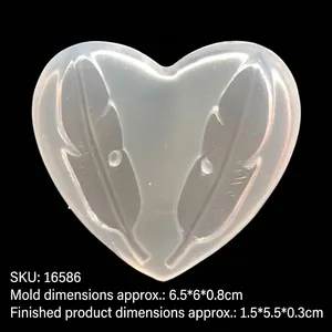 Translucent heart-shaped silicone mold with fine feather patterns for DIY resin crafts