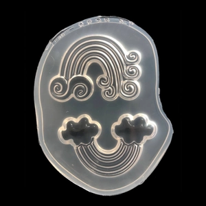 Macro detail of translucent silicone mold featuring rainbow and cloud shapes for resin DIY