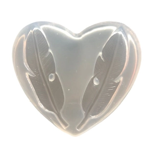 Translucent heart-shaped silicone mold with feather patterns for DIY resin crafts
