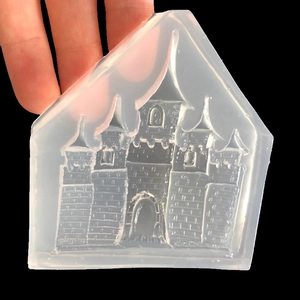 Translucent silicone mold featuring detailed castle architectural design for DIY epoxy resin