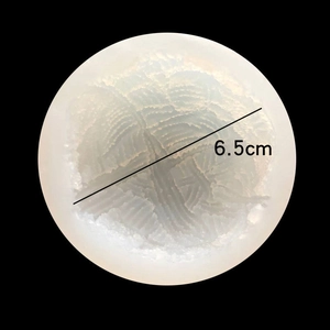 Vue de dessus du moule en silicone de 6,5 cm avec texture de laine pour bougies et savons