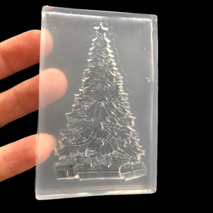 Handheld translucent silicone mold with Christmas tree and gift box relief design