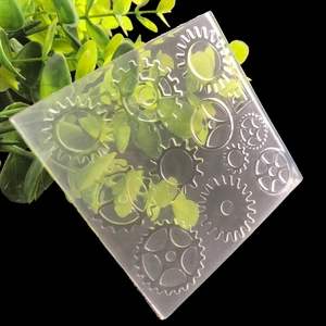 Transparent silicone gear mold for resin crafting featuring industrial steampunk patterns