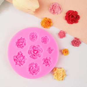 Pink silicone mold with eight rose patterns for DIY cake decorating and craft making