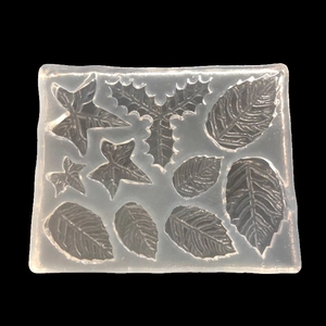 Translucent silicone leaf mold with various foliage shapes for resin and fondant crafting