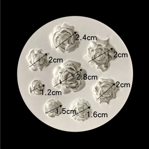 White silicone rose fondant mold with various flower sizes for DIY cake decorating