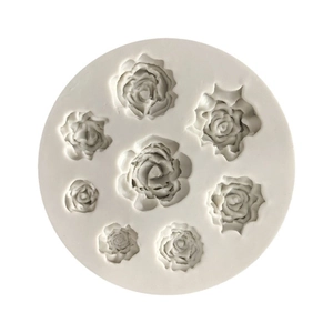 White silicone mold with 8 realistic rose flower cavities for fondant cake decorating