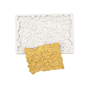 White silicone mold for realistic rock texture with a yellow finished stone resin sample