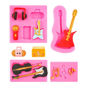 Stampi in silicone rosa a tema musicale con chitarra e cuffie per decorazione torte