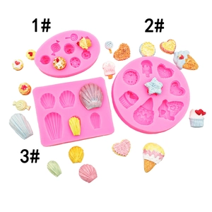 Pink silicone fondant molds set with seashell heart and candy shapes for DIY cake decor