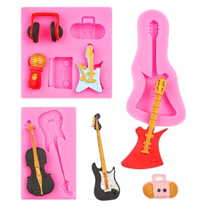 Stampi in silicone rosa a forma di chitarra e strumenti musicali per decorazioni dolci