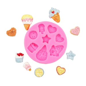 Pink silicone mold detail showing heart, star, and ice cream cupcake shapes for DIY crafts