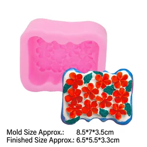 Pink silicone mold for handmade soap and cake featuring floral embossed textures