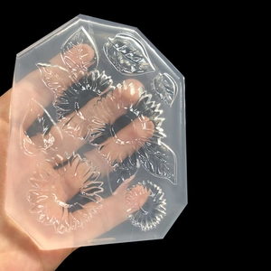 Moule hexagonal en silicone transparent avec motifs de tournesol et feuilles pour résine