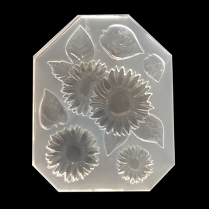 Détail macro du moule en silicone octogonal de tournesol pour bijoux en résine et DIY
