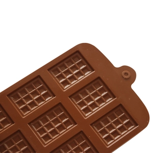 Brown 12-cavity silicone waffle mold for chocolate and baking with grid texture design