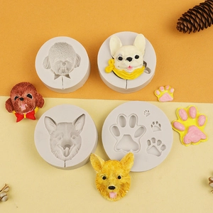 Detailed silicone mold set showing teddy, bulldog, corgi and paw print lollipop designs