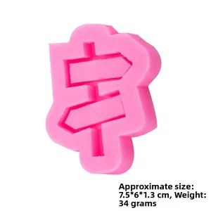 Detailed view of pink silicone directional sign mold with 7.5x6x1.3cm dimensions