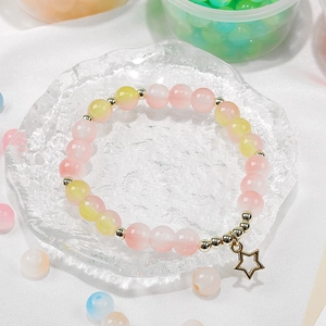 8mm roze en geel verloop glazen kralen armband met gouden ster bedeltje op glas