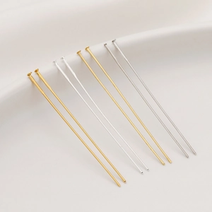 Platkopstiften in goud en zilver voor DIY-sieraden en het maken van oorbellen
