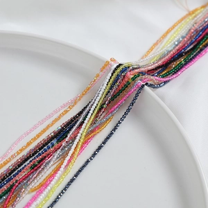 Macro shot of 2mm faceted multi-color crystal glass beads for DIY jewelry making