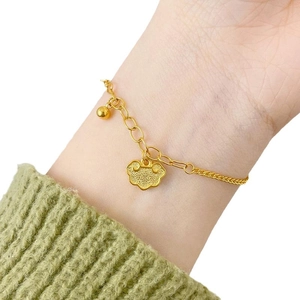 Adjustable 24K gold plated bracelet with traditional lock pendant and small gold bead