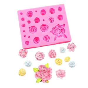 Moule à fondant en silicone rose avec diverses formes de roses et pivoines en argile