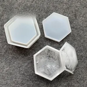 Macro view of hexagonal silicone resin mold set with white fiber decorative filling