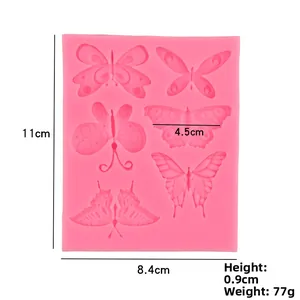 Moule papillon en silicone rose montrant les dimensions pour la décoration de gâteaux