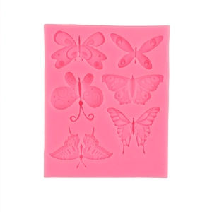 Moule papillon en silicone rose avec cinq cavités pour décoration de gâteaux et pâtisserie