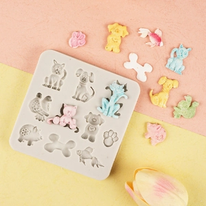 Detailed silicone mold with cat, dog, and bone shapes for DIY cake and chocolate decoration