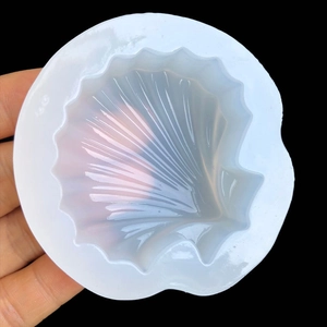 Détail macro d'un moule en silicone souple en forme de coquillage pour résine DIY