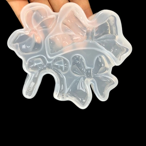 Stampo in silicone traslucido con fiocchi per resina e decorazioni per pasticceria