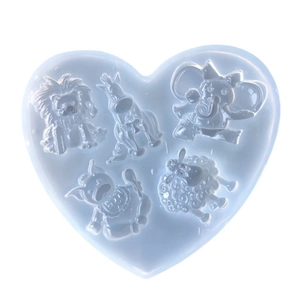 Heart-shaped silicone mold with five animal shapes including lion, elephant and sheep