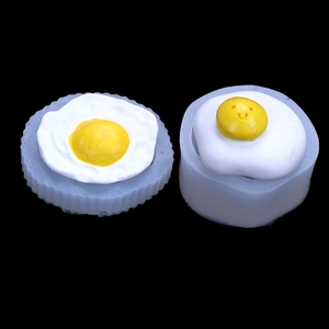 Silicone mold set for fried egg shapes featuring cute smiling faces for DIY crafts