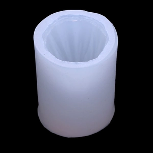 Blue translucent cylindrical silicone mold with vertical ribbed texture for DIY crafts