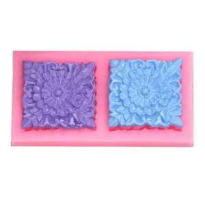 Pink silicone mold for DIY square floral mandala wall decor with detailed relief pattern