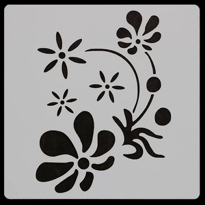 Detail showing white plastic floral mandala stencil for DIY painting on black background