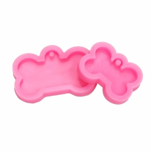 Pink dog bone silicone mold for resin keychains and pet tags in two sizes