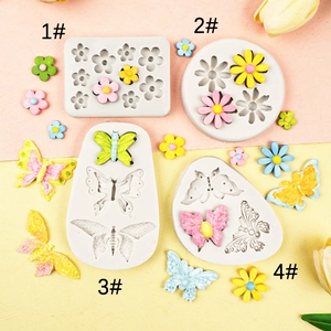 4-piece silicone fondant mold set featuring daisy flowers and butterfly patterns for cakes