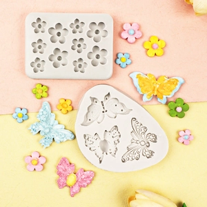 Detailed silicone mold set featuring diverse daisy flowers and butterflies for DIY crafts