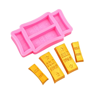 Pink silicone mold for DIY gold bar shapes with detailed 999.9 gold brick engravings