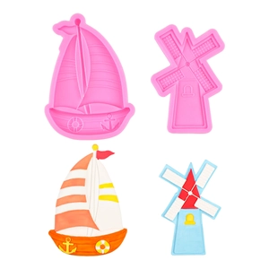 Pink silicone mold set for creating sailboat and windmill shaped fondant and clay decorations