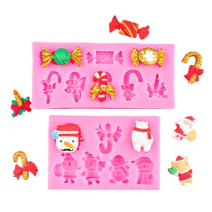 Rosa Silikonform-Set mit Schneemann, Zuckerstange und Weihnachtsmann für Backen